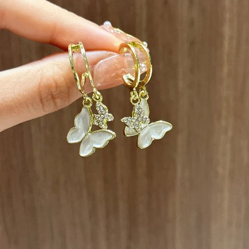 Lindos pendientes de botón con forma de mariposa y flores para mujer Exquisitos