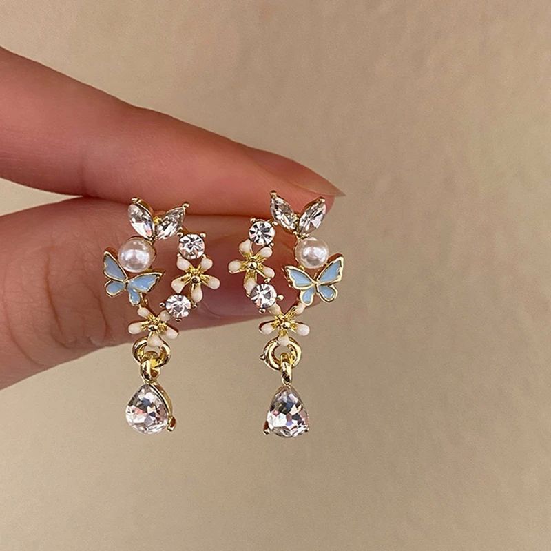 Lindos pendientes de botón con forma de mariposa y flores para mujer Exquisitos